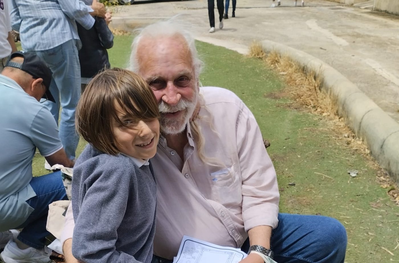 Grandparents and children celebrate in the sun
